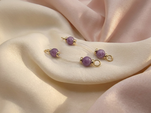 Lepidolite Non-Piercing Nipple Rings Pair of adjustable, non-piercing nipple rings featuring genuine purple Lepidolite gemstone beads and gold stainless steel accents,